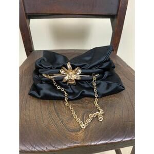 BCBGMAXAZRIA little gold hibiscus purse